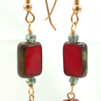red opaque with dangle on gold